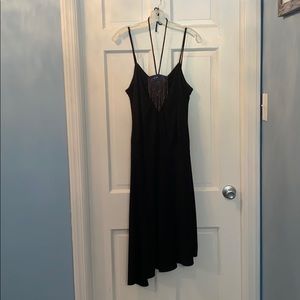 Black halter dress with multicolored appliqué